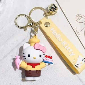 🎅🏻 SALE! Hello Kitty Baker Yellow and Pink bag Charm keychain with cakes new 2”